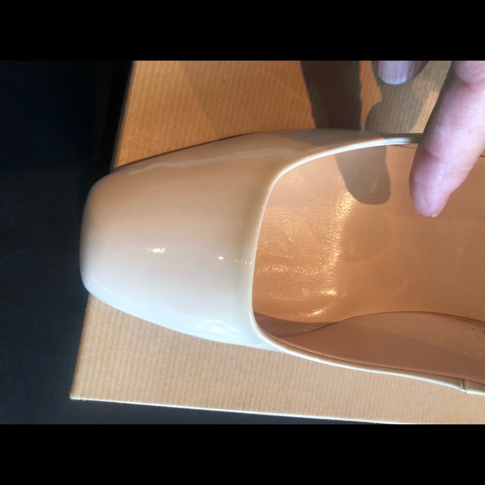 Christian Louboutin cream colored pump. New.